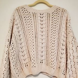 Chunky, cut-out creme sweater